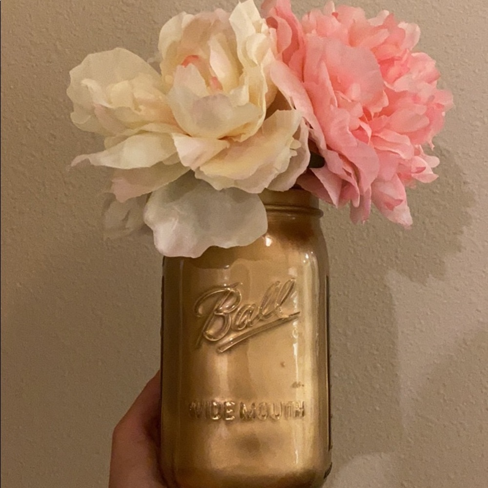 Mason jar with fake flowers